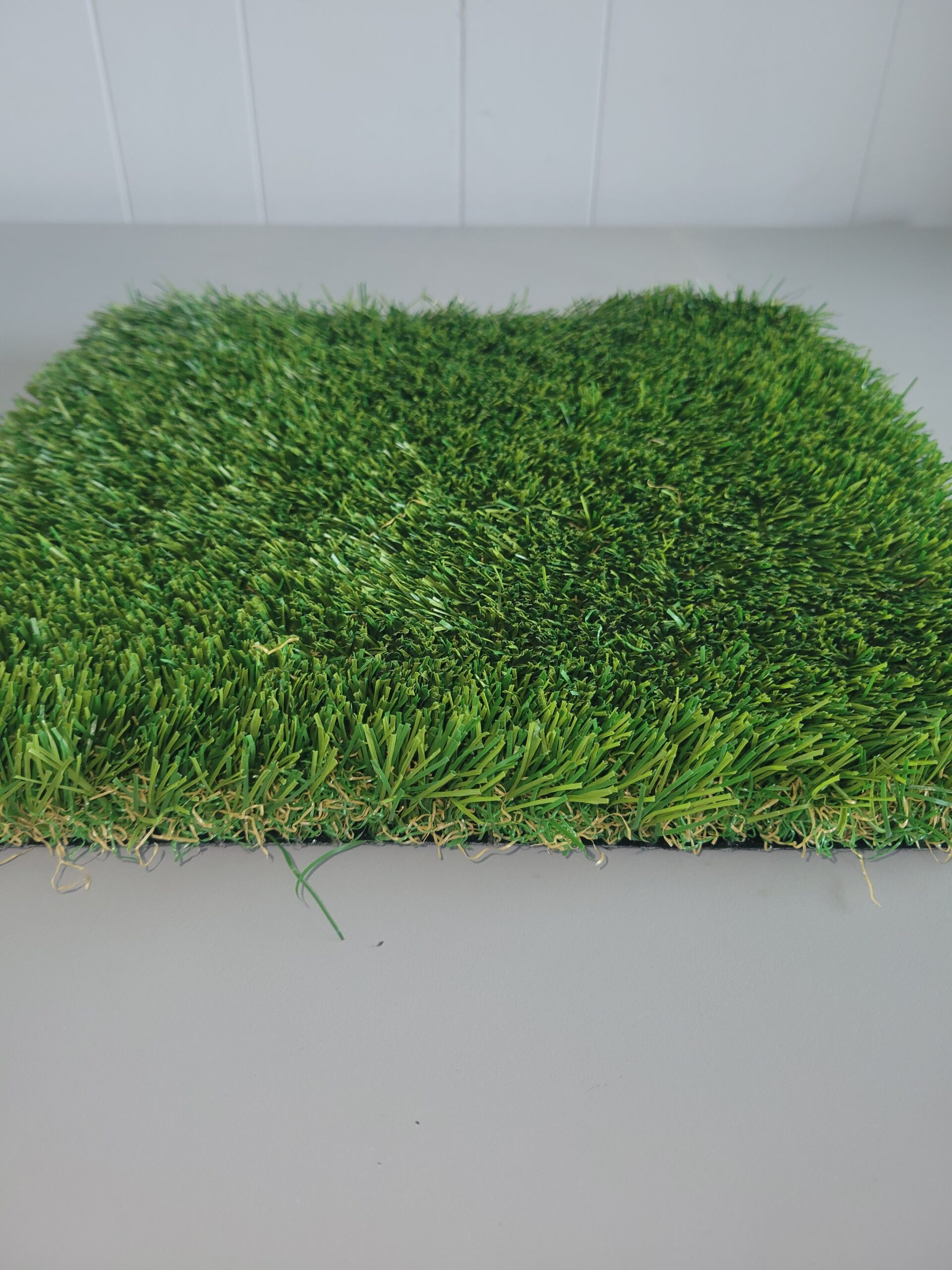 A. SoftSport Landscape Turf  $ 3.95 per square foot  ( 1 x 1 )